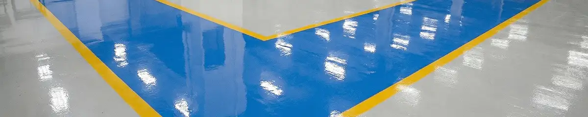 A factory floor professionally covered and marked with epoxy flooring in Providence, RI