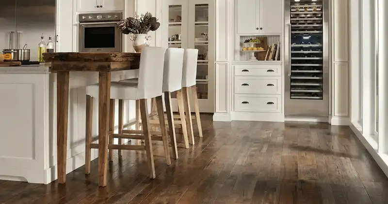 Professionally installed and refinished hardwood flooring in a residential home, showcasing smooth finish and natural wood tones in Providence, RI