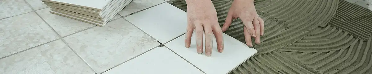 Professional installing white tile floors in Providence, RI