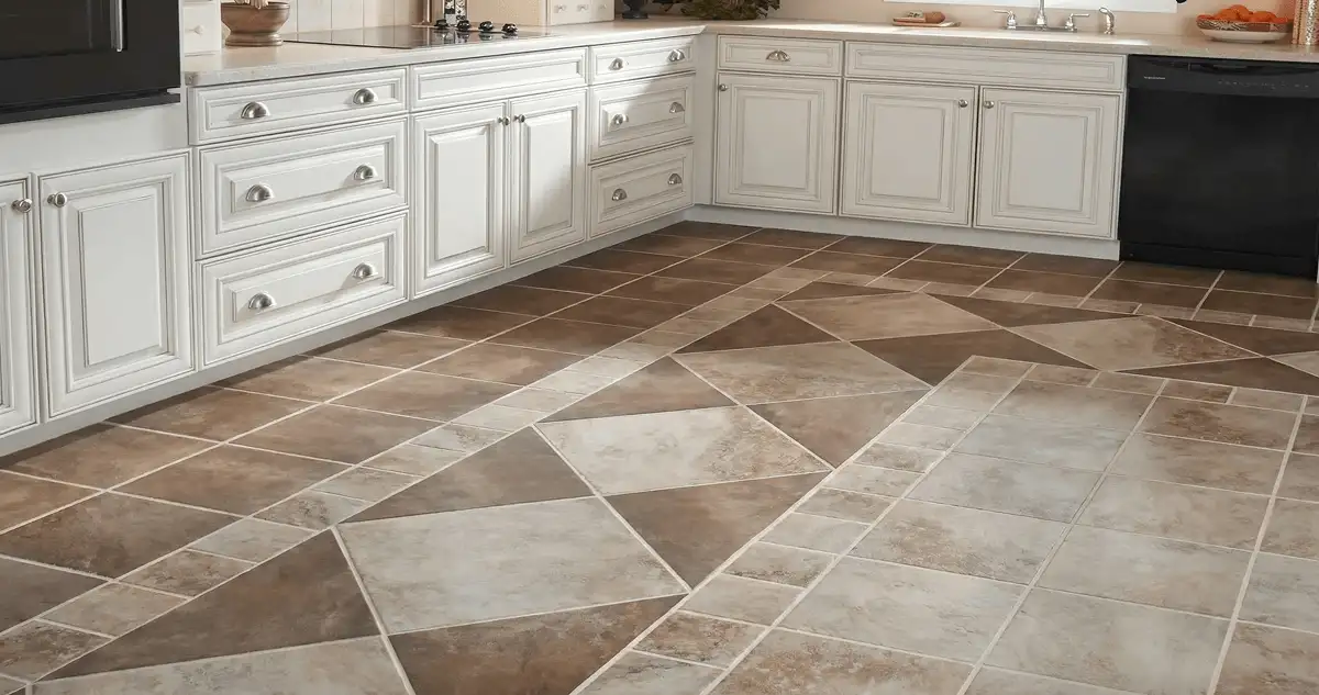 Kitchen with white cabinets and a professionally installed tile floor in Providence, RI